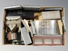 A quantity of model railway buildings and decorations.