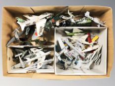 A group of die cast scale model aircraft.