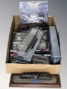 Two scale model locomotives on plinths, a Corgi Aviation Archive modelling set, battleship models,