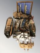 A group of scale model fishing trawlers.