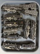 A group of die cast locomotives and tenders including Triang.