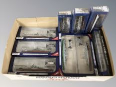 A group of Atlas Editions scale naval models in packaging
