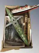 A group of scale model WWII battleships, ocean liners, etc.