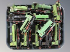 A group of painted card miniature locomotives.