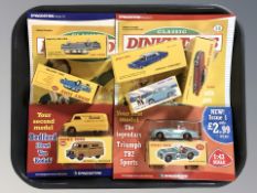 A group of Deagostini die cast cars