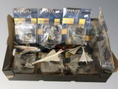 A group of scale model aircraft, some in packaging.