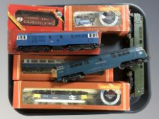 A group of Hornby Triang OO gauge die cast locomotives and passenger cars, some boxed.