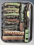 20th century tin plate locomotives and passenger cars including Trix.