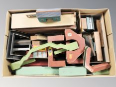 A quantity of model railway buildings and decorations.