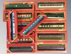 Thirteen Hornby Triang OO gauge passenger cars in boxes.