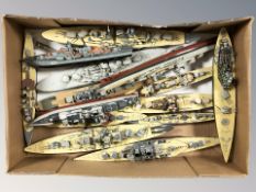 A group of scale model WWII battleships.