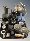 A group of pewter tea wares, vintage torch, vesta case, an amber cheroot,