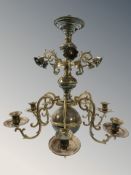 An ornate brass chandelier,