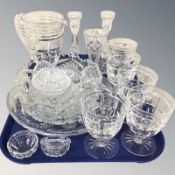 A pair of crystal candlesticks, drinking glasses, bowls, etc.