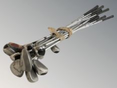 A set of Slazenger left handed golf clubs.