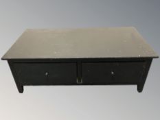 An ebonised low entertainment cabinet,