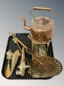 A Victorian copper kettle, brass trivet, wall pocket, brass tap, embossed relief wall panel, etc.