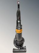 A Dyson DC25 vacuum cleaner.