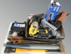 Modern power tools including DeWalt nail gun, Black & Decker circular saw,