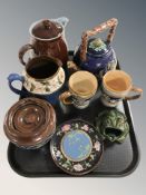 A pair of Doulton Lambeth mugs, further earthenware teapots and jugs,