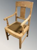 A Continental oak armchair