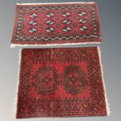 Two Afghan Turkoman rugs, largest 97 cm x 57 cm.