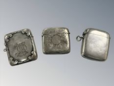Three antique silver vesta cases, largest 5 cm long. CONDITION REPORT: 91.4g gross.