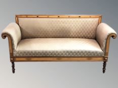 An early 20th century continental inlaid walnut framed settee,