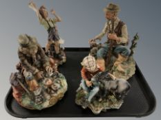 Four Capodimonte bisque figurines.