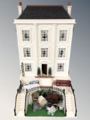 A large contemporary Georgian style doll's house, with front garden,