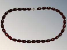 A Cherry amber necklace, length 81 cm, gross weight 132.1g.