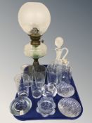 An oil lamp and a group of Scandinavian glassware including Holmegaard and other tea light holders,
