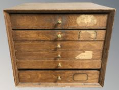 A late 19th century oak five drawer index chest,
