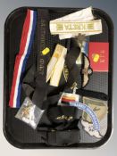 A group of reproduction military insignia.