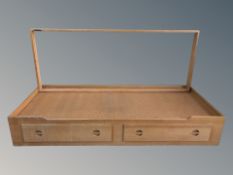 A Danish oak day bed, length 204 cm.