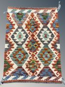 A Chobi Kilim rug, 84 cm x 64 cm.