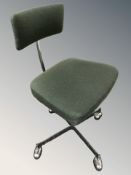 A 20th century chrome and enameled metal swivel desk chair.