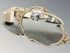 A modern cream and gilt mirror, 79 cm x 51 cm, and a similar silvered mirror.