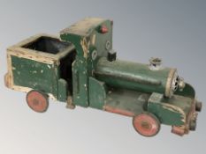 A hand made wooden model of a steam locomotive, length 71 cm.