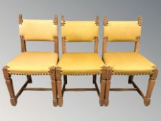 A set of eight Danish blond oak dining chairs