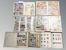 Eight albums of world stamps.
