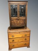 A late Victorian inlaid rosewood double door music cabinet and a pine three drawer chest,