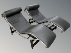 A pair of Le Corbusier style chrome and black leather lounge chairs,