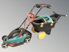 A Bosch electric mower and a wheel barrow