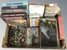 A group of tabletop gaming miniatures including Warhammer.