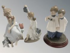 A Lladro figure of a girl on the telephone with a puppy at her feet No.