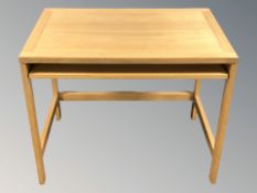 A modern Scandinavian oak computer desk,