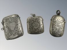 Three antique silver vesta cases, largest 5 cm long. CONDITION REPORT: 48.8g gross.