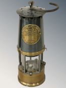 An Eccles Protector Type SL miner's safety lamp.