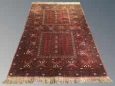 A Turkoman carpet, Afghanistan, 260 cm x 159 cm.